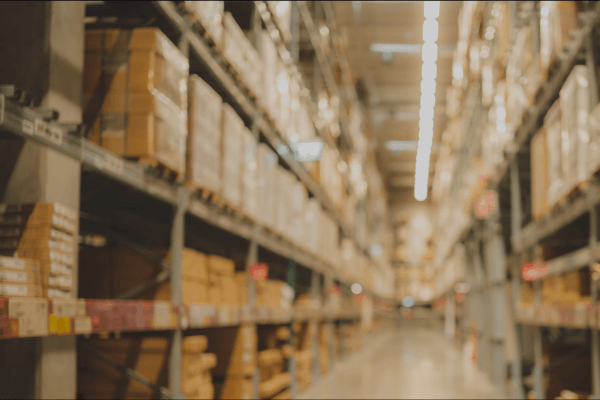 a view of a a warehouse with shelves that hold inventory for Superior Performance  (1)
